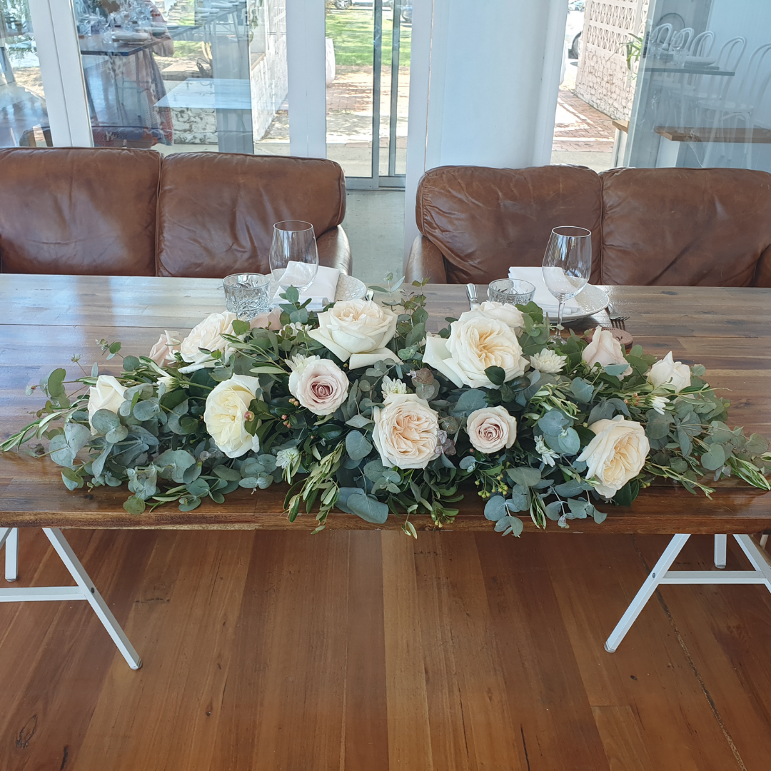 Neutral and nude wedding table arrangement